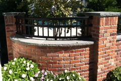 Curved wall caps and square pier caps with rocked edges